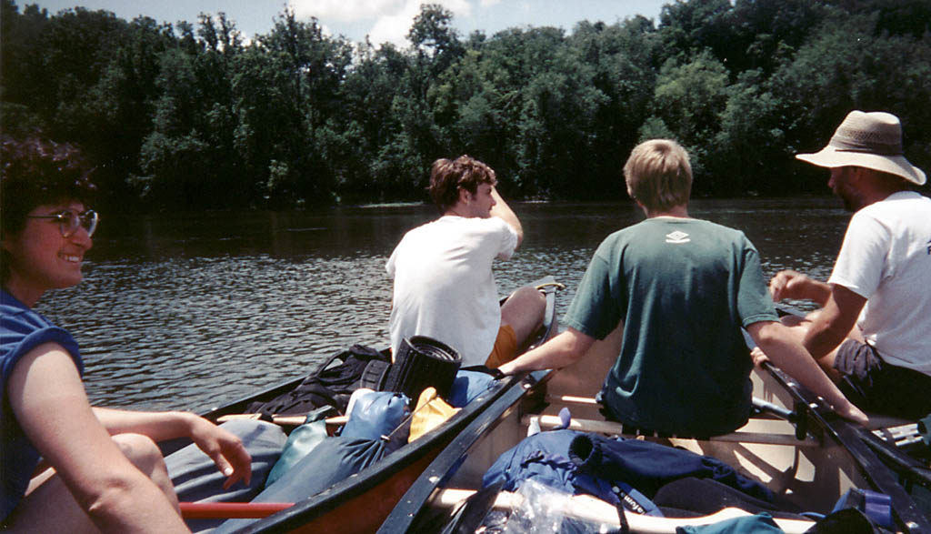 Marci, Will, Sarah and Mike.  Will paddling three boats at once. (Category:  Paddling)