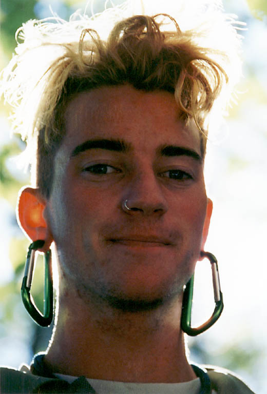 Brian with his carabiner earrings up to 8mm in diameter... on the way to full size 10mm biners. (Category:  Rock Climbing)