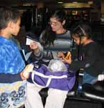 Nassor, Rachel and Sophia in Dulles Airport. (Category:  Travel)