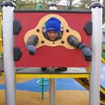 Nassor enjoying a playground. (Category:  Travel)