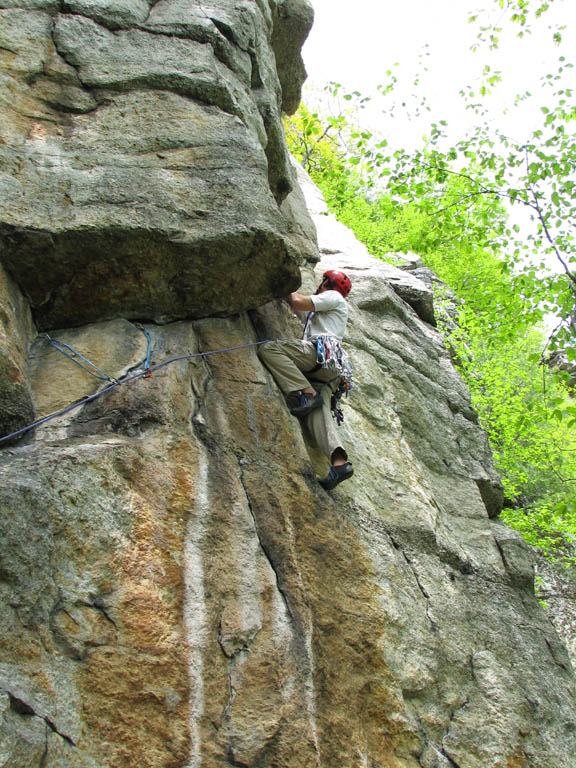 Leading Directissima.  Just past the initial ramp. (Category:  Rock Climbing)