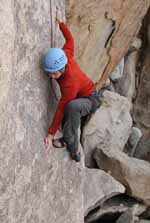 Kenny on the hard opening moves of The Kid, Saddle Rock. (Category:  Rock Climbing)