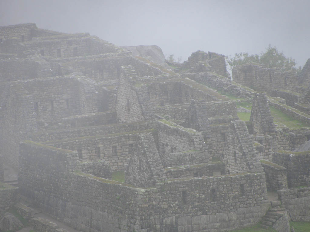 Machu Picchu emerging from the mist. (Category:  Travel)