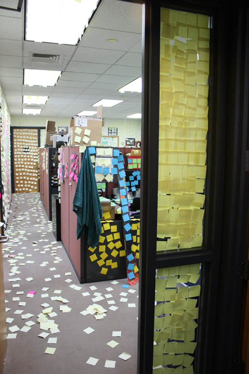 The post-its on the floor are sticky side up.  Makes walking difficult. (Category:  Party)