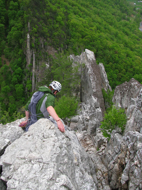 Guy starting down from the South Summit. (Category:  Rock Climbing)