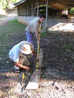 Rolando and Dave making a bamboo pole for the big shot. (Category:  Travel)