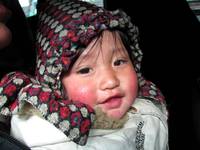 Amin, 10 months old.  She sat with her mother next to me for an hour or so on the bus. (Category:  Travel)