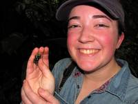 Tara holding a Black and Green Dart Frog. (Category:  Travel)