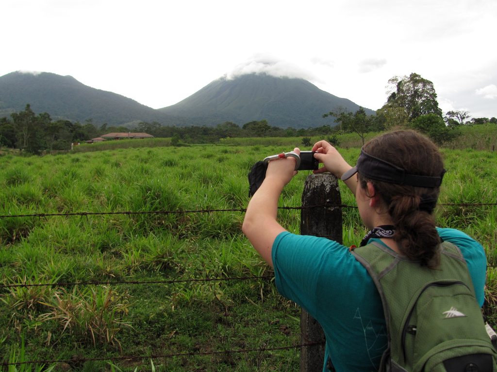 Tara getting a picture of Arenal. (Category:  Travel)