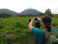Tara getting a picture of Arenal. (Category:  Travel)