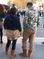 Gaudy Clothes: North Face camo jacket and Uggs. (Category:  Travel)
