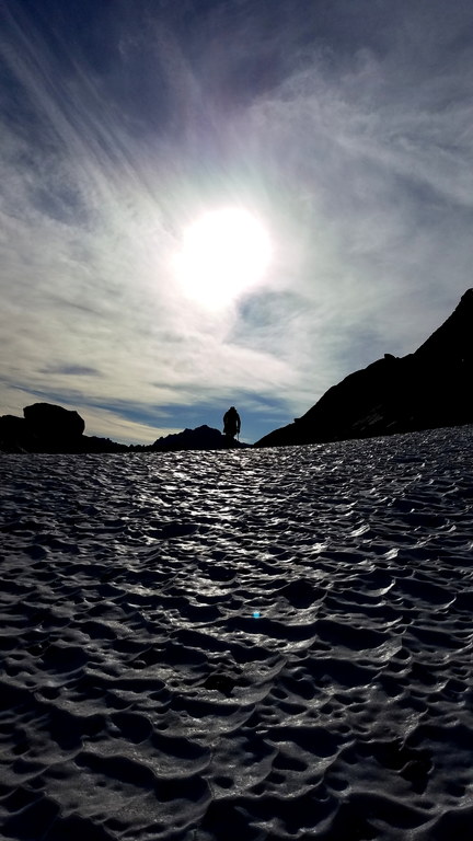 Guy walking across Stuart Glacier (Category:  Rock Climbing)