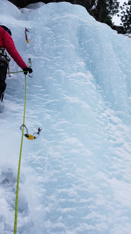Jackie's first ice lead. A short flow in the South Park section. (Category:  Ice Climbing, Skiing)