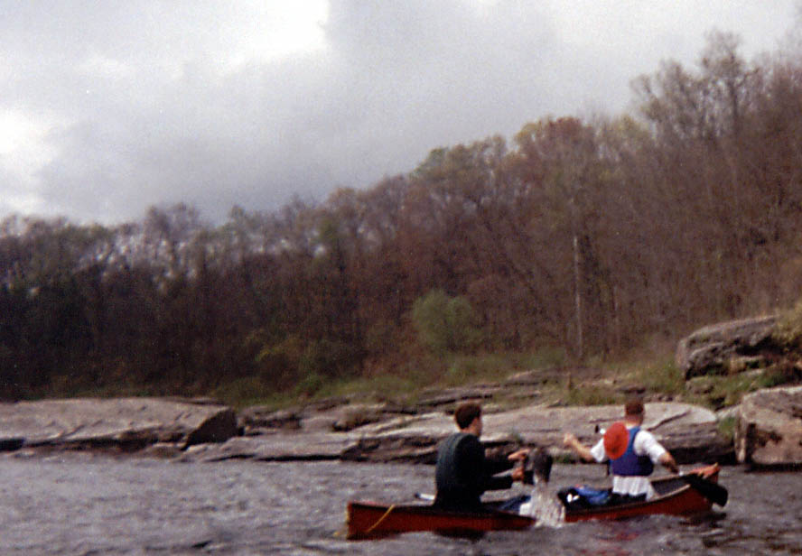 Me and Will bailing our canoe. (Category:  Paddling)