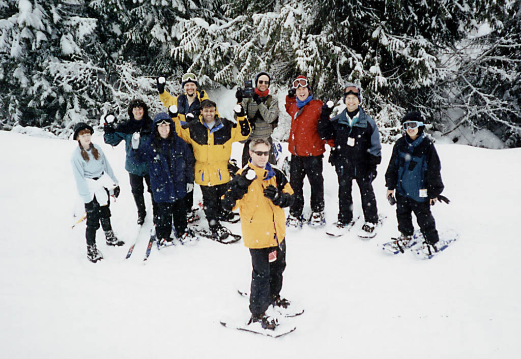 Snowshoeing with the skigroup as they prepare to pelt me with snowballs. (Category:  Skiing)
