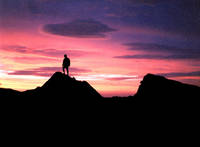 Tom silhouetted against the sunset. (Category:  Rock Climbing)