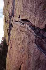 Horizontal hand traverse at the start of the fourth pitch of Rewritten. (Category:  Rock Climbing)