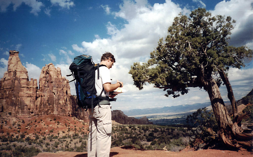 Checking the map at the base of the monument. (Category:  Rock Climbing)