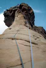 Reaching the summit. Note how the wind is tugging the ropes sideways. (Category:  Rock Climbing)