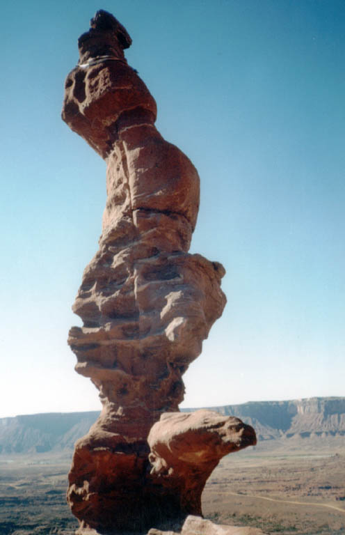 The corkscrew. Diving board is the bulge on the bottom right. Anchor slings are visible around the top. (Category:  Rock Climbing)