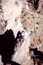 Lauren at the third belay viewed from the summit. (Category:  Rock Climbing)