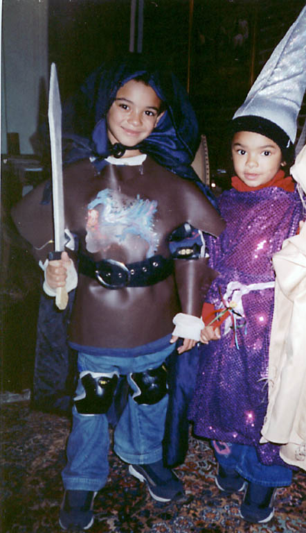 Nassor and Sophia in Halloween costumes. (Category:  Family)