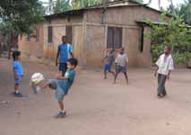 Nassor and Sophia playing soccer. (Category:  Travel)
