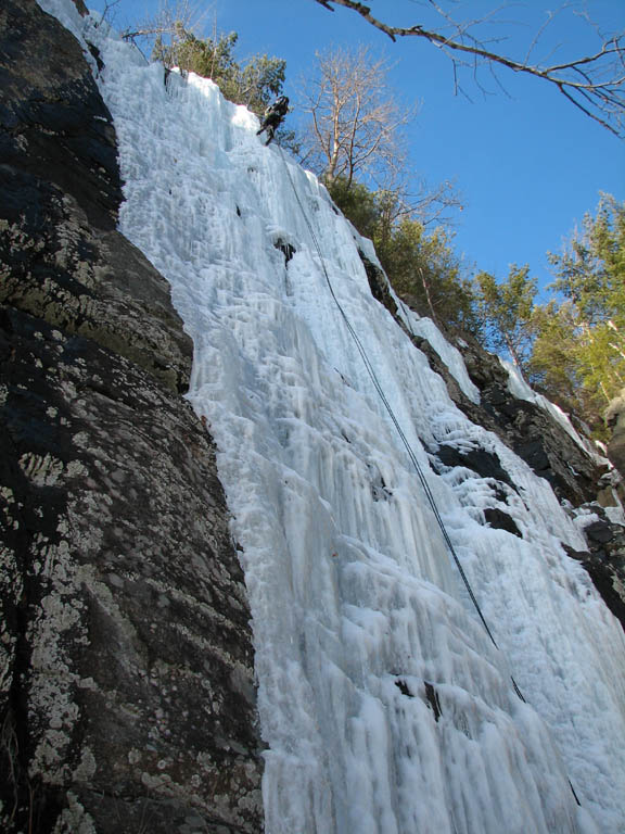Becky rappelling the main flow of Mineville Pillar. (Category:  Ice Climbing)