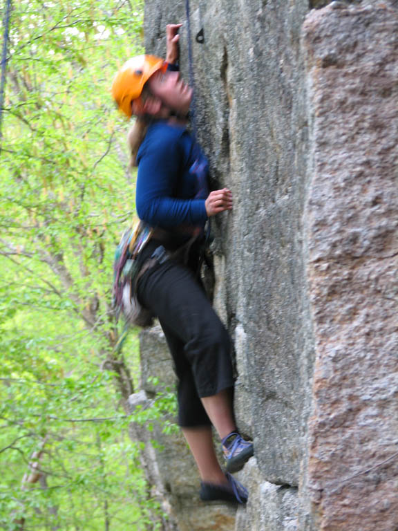 Katie making a big move. (Category:  Rock Climbing)