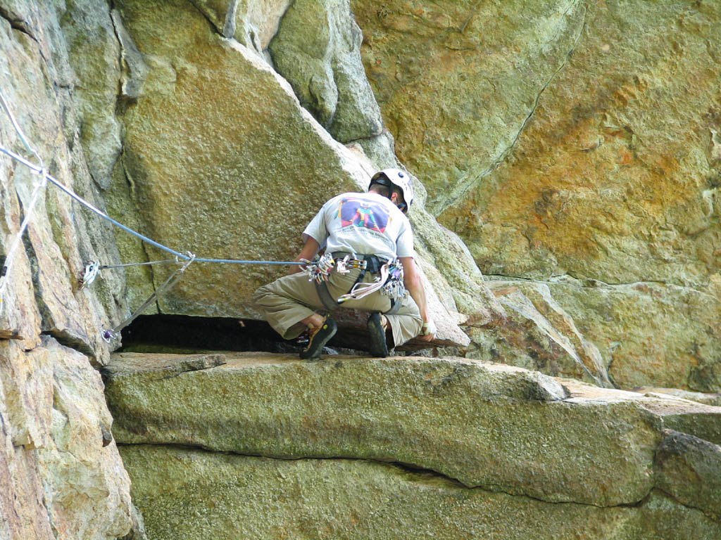 Ryan moving through the crux of Inverted Layback. (Category:  Rock Climbing)
