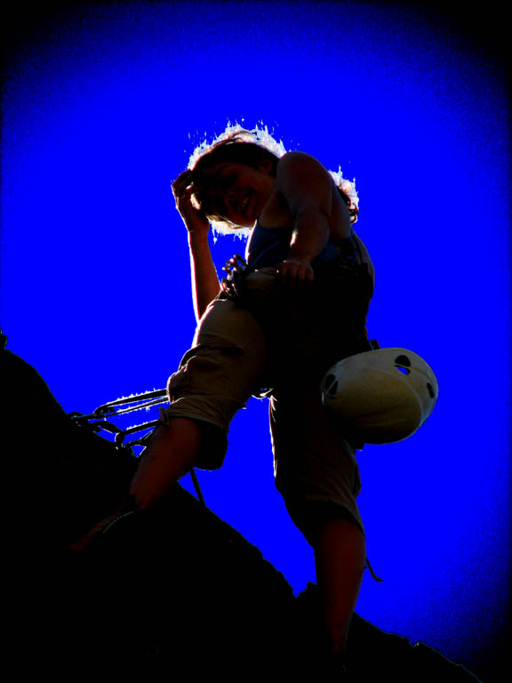 Bridgette at the top of Rope De Dope.  Enhanced with Photoshop. (Category:  Rock Climbing)