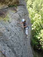 Laura at the anchors on Ledger Line. (Category:  Rock Climbing)