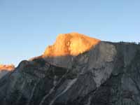 This time of year the last rays of sunshine illuminate Half Dome.  The golden glow reflecting off the granite actually casts shadows in Yosemite Valley. (Category:  Rock Climbing)