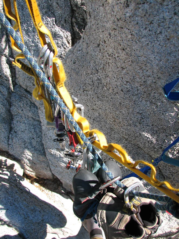 Nothing like taking off your shoes at a long belay. (Category:  Rock Climbing)