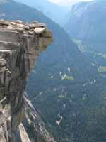 The Diving Board which overhangs the sheer face of Half Dome. (Category:  Rock Climbing)