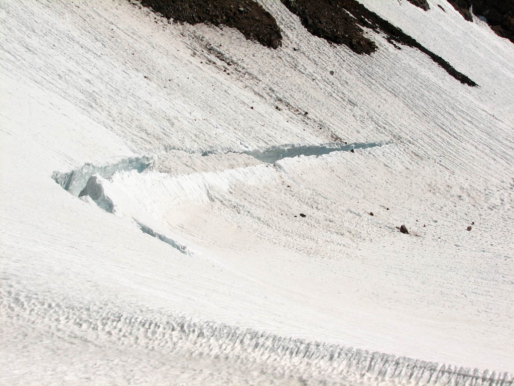 I believe this is the bergschrund for Konwakiton glacier on Mt. Shasta. (Category:  Rock Climbing)