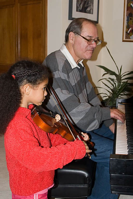 Sophia and Dad in concert. (Category:  Family)