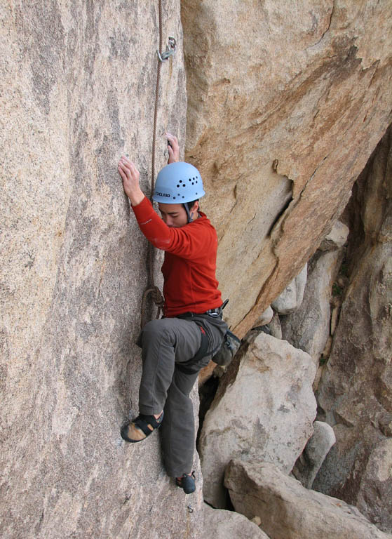Kenny on the hard opening moves of The Kid, Saddle Rock. (Category:  Rock Climbing)