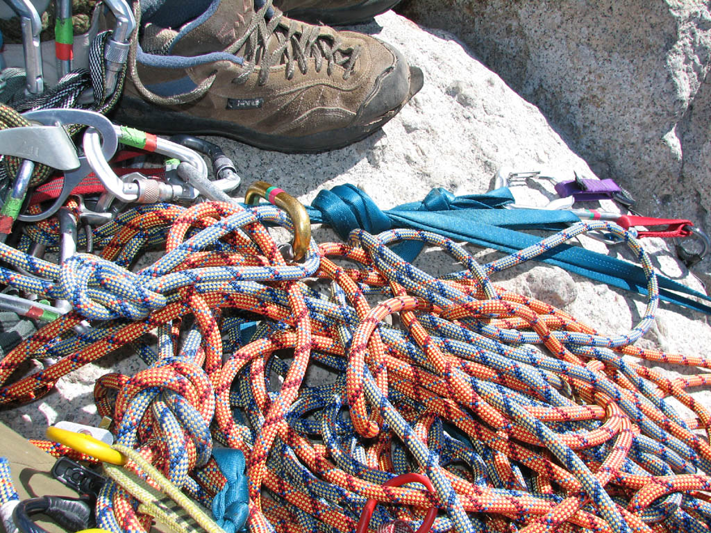 Five people, three ropes and two belays all attached to the summit anchor.  This picture is destined to be (Category:  Rock Climbing)