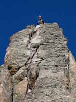 Guy at the end of a long pitch on the East Ridge. (Category:  Rock Climbing)