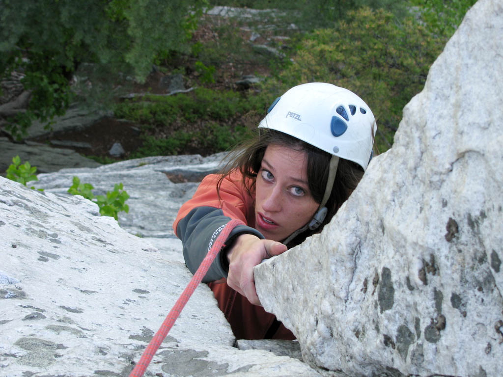 Jen reaching the top of Three Doves (Category:  Rock Climbing)