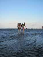 Alex and me walking in the ocean to cross the Rio Claro. (Category:  Travel)