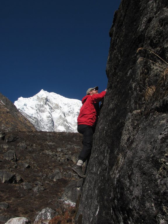 Me bouldering with Langtang Lirung in the background. (Category:  Travel)