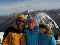Rob, Kristina and Casey.  That is Mount Colden in the background. (Category:  Ice Climbing)