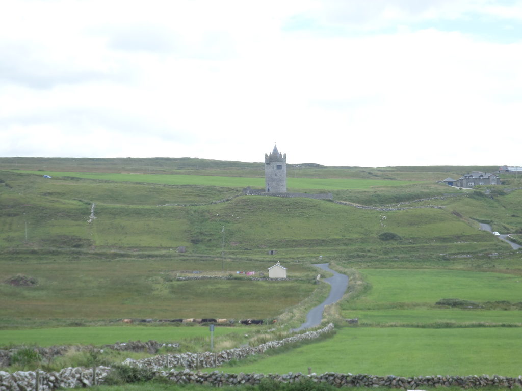 Really, though, what most excited Marissa about the whole trip was the ubiquity of castle ruins. Here, for example, is one we saw outside of Doolin (Category:  Travel)