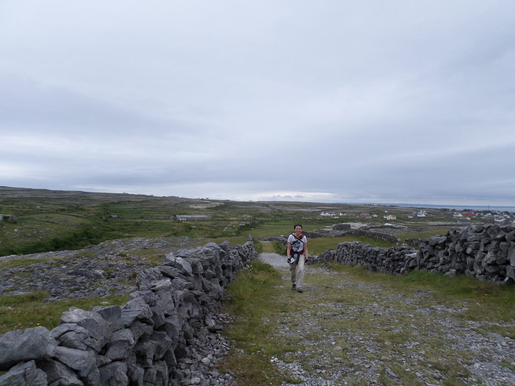 We biked partway to the Black Fort but had to switch to walking when the path got too gravelly. Here, Marissa is walking up the path (Category:  Travel)